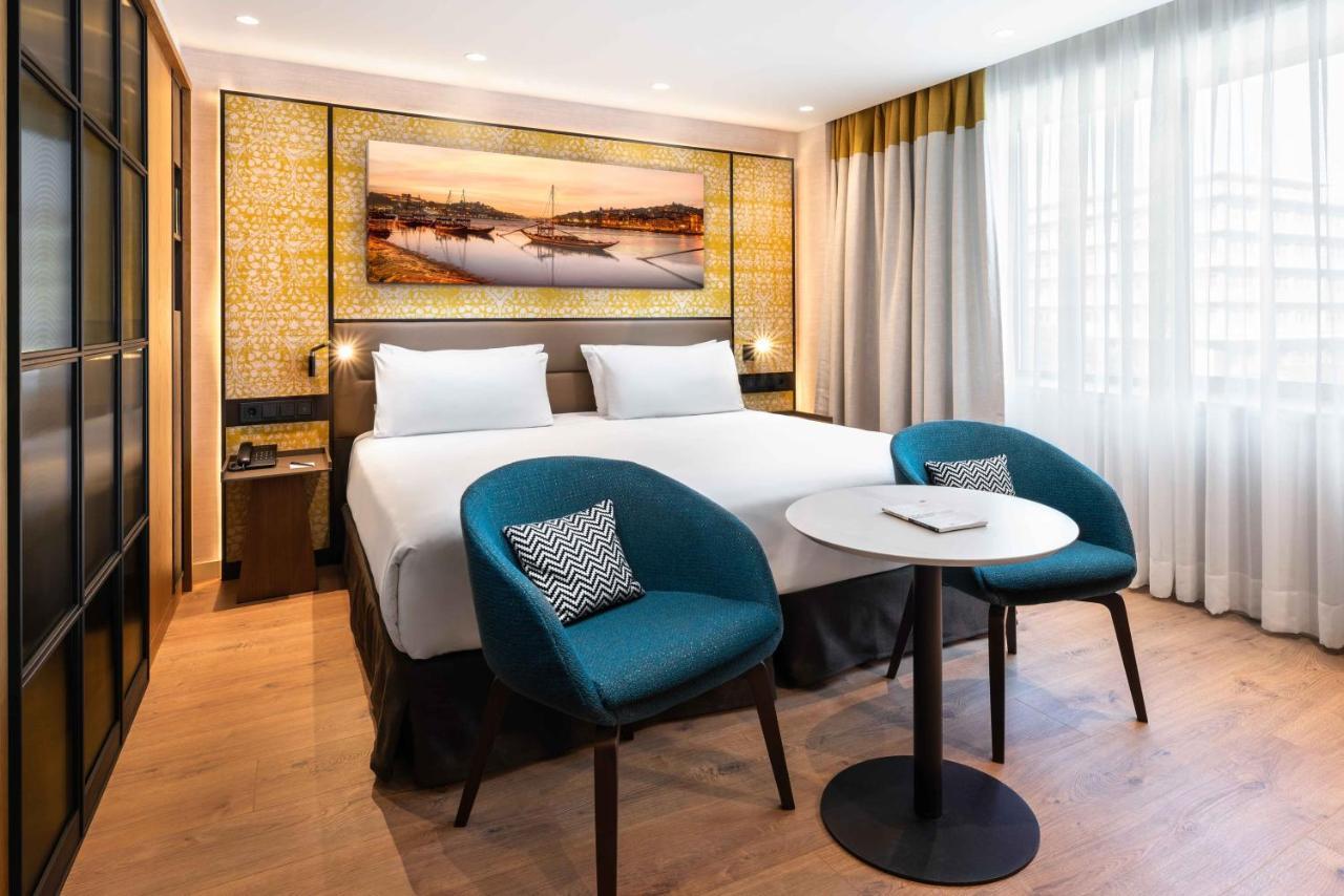 Eurostars Aliados Hotel Porto Luaran gambar A room at the hotel