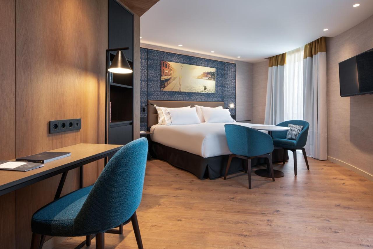 Eurostars Aliados Hotel Porto Luaran gambar A room at the hotel