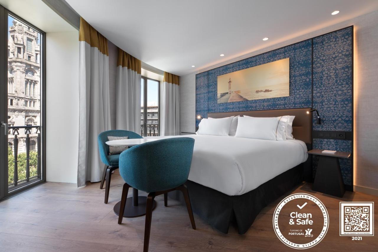 Eurostars Aliados Hotel Porto Luaran gambar A Clean & Safe certified hotel room in Lisbon, Portugal
