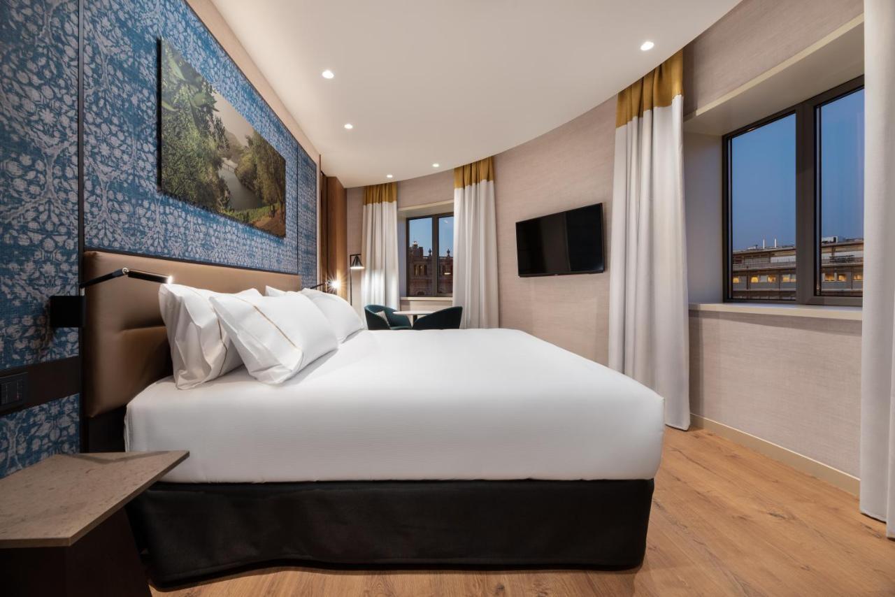 Eurostars Aliados Hotel Porto Luaran gambar A bedroom at the hotel