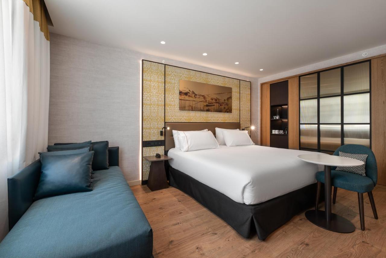 Eurostars Aliados Hotel Porto Luaran gambar A room at the hotel