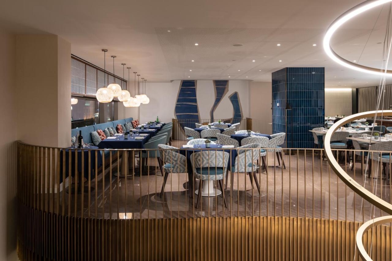 Eurostars Aliados Hotel Porto Luaran gambar The interior of the restaurant